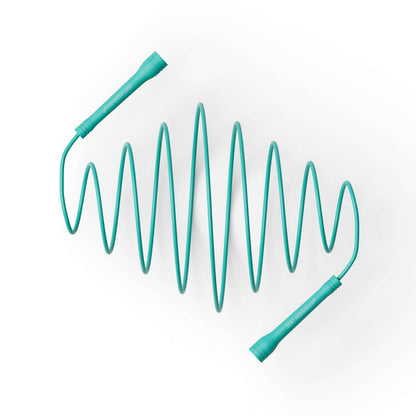 A teal jump rope coiled in a zigzag pattern, perfect for fitness enthusiasts and cardio workouts.